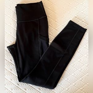 Fabletics On-The-Go 7/8 Powerhold Black Leggings with pockets